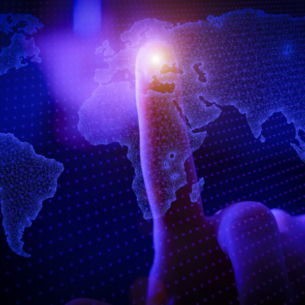 Global News and technology network communication concept a businessman touches a global web map