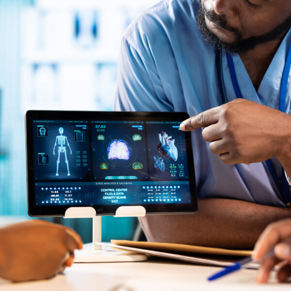 Nurse showing suggestions on AI screen